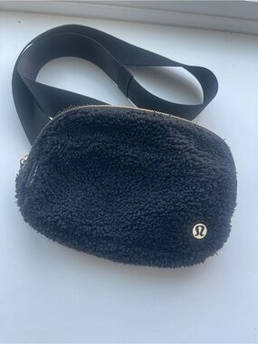 lululemon athletica Black Sherpa Crossbody Pouch with Gold Accent